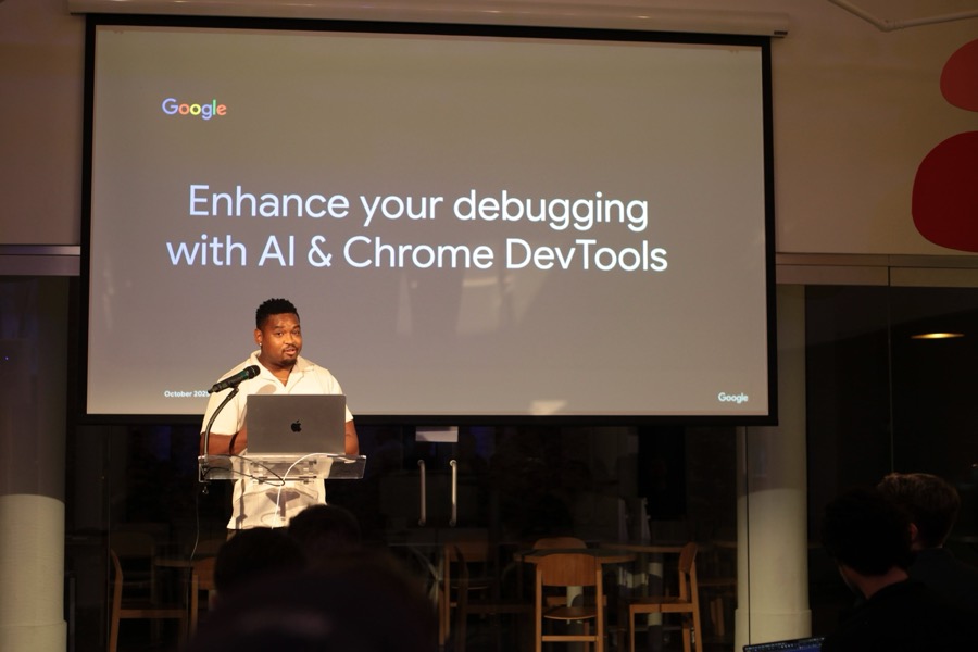 A speaker presenting on AI and Chrome DevTools